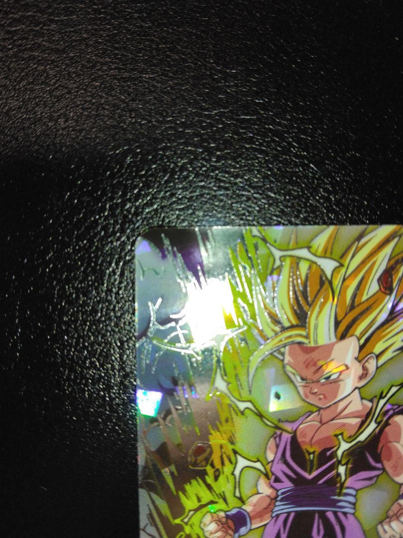 スーパードラゴンボールヒーローズ UM12-SEC3 孫悟飯：少年期と悟空