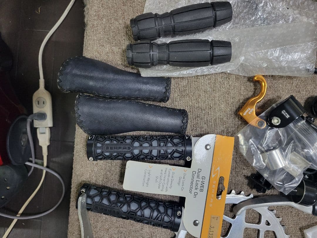 車輪掛け、ハンドルグリップ、自転車持運びカバー、ツェーン