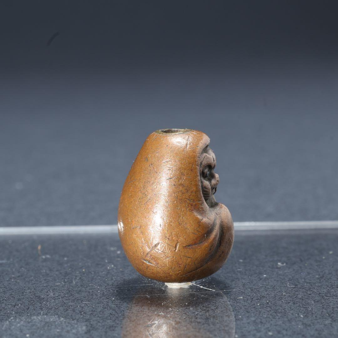 緒締め玉　達磨　提げもの　金属　茶色　金工　R1641