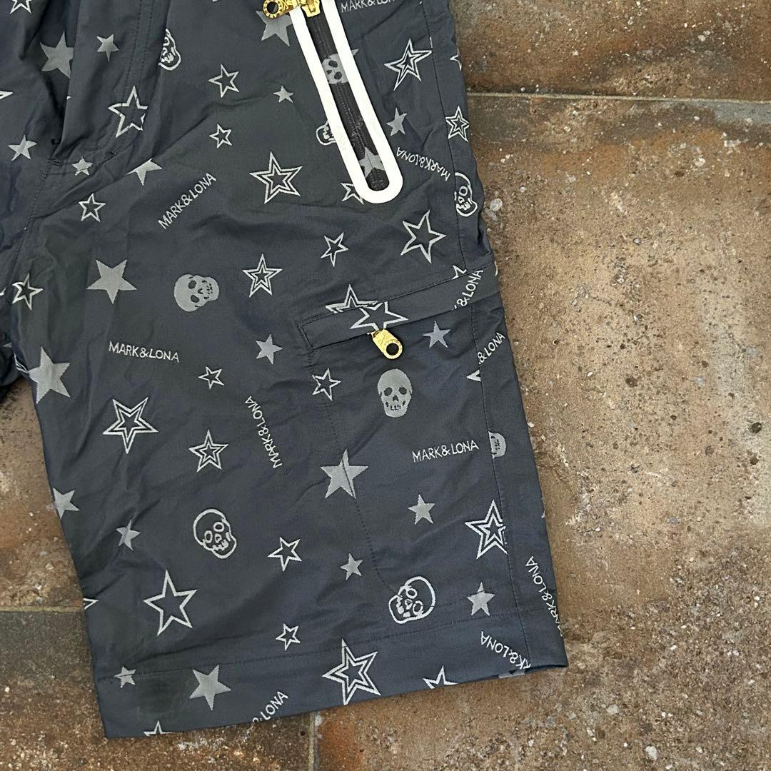 MARK&LONA レインウェア　セットアップジャケット パンツ 4way 総柄