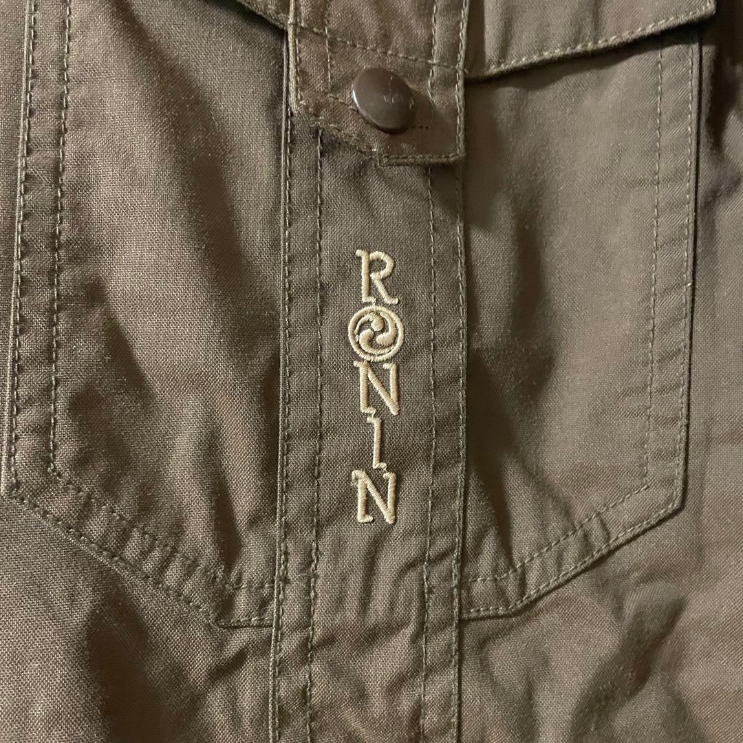 Burtonバートンスキーウェアスノーボードジャケットパーカーフード茶色ブラウン