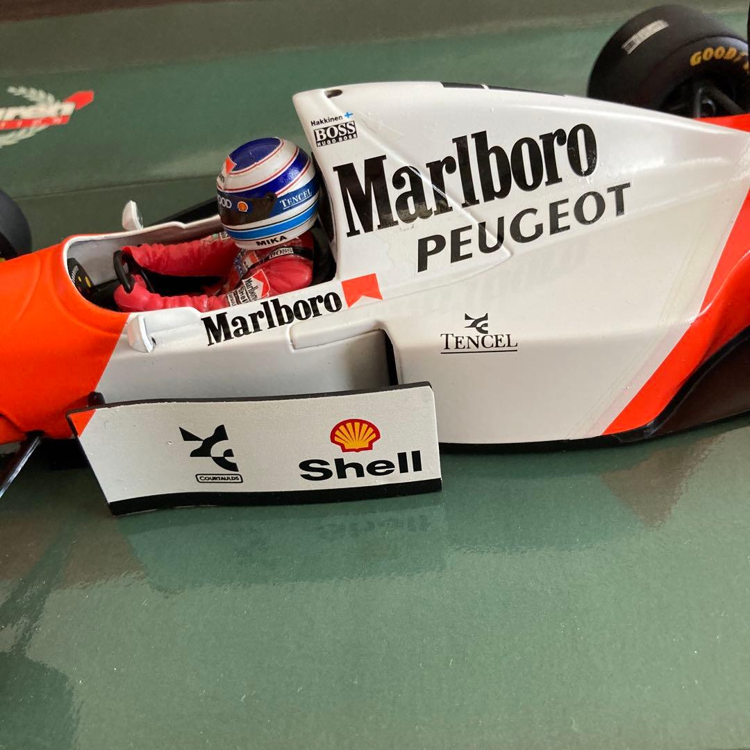ミニカー Marlboro McLaren Peugeot MP4/9 1/18