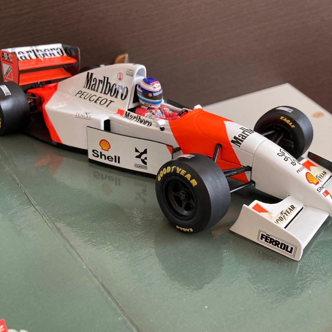 ミニカー Marlboro McLaren Peugeot MP4/9 1/18