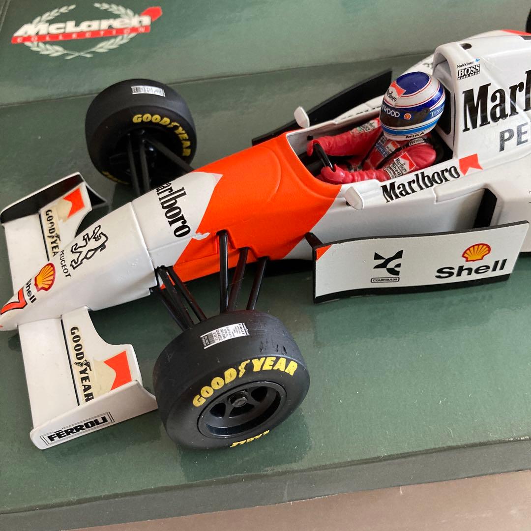 ミニカー Marlboro McLaren Peugeot MP4/9 1/18
