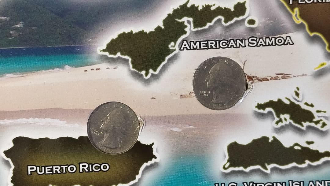 ♥♥。アメリカ25セントクォーター50州記念アルバム(56枚在中)。