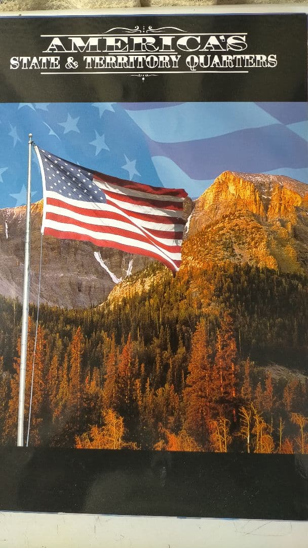 ♥♥。アメリカ25セントクォーター50州記念アルバム(56枚在中)。