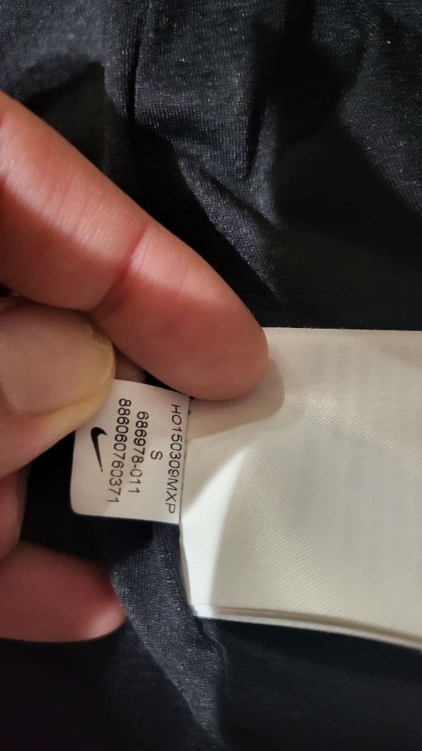 レディース Nike シールドウィンドブレーカー ナイロンジャケット