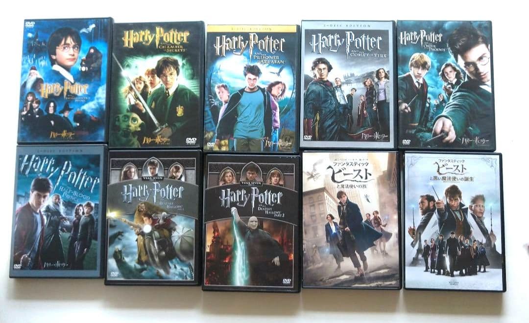 ハリーポッターまとめ売り。本、dvd、ノート、メモ、バッジ他 全巻セット