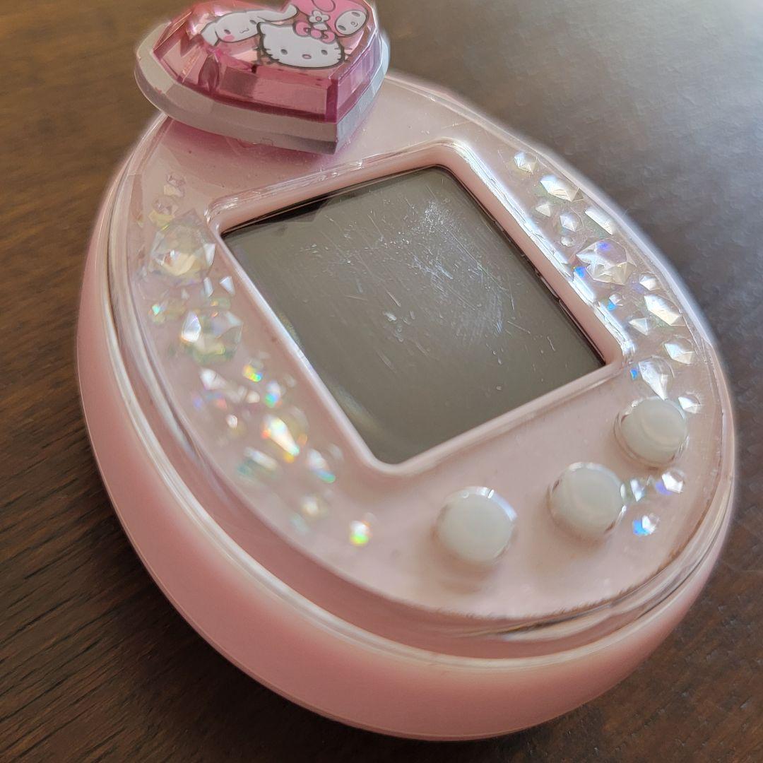 たまごっちピース本体+たまデコピアス（サンリオ）/ピンク/箱・説明書付き