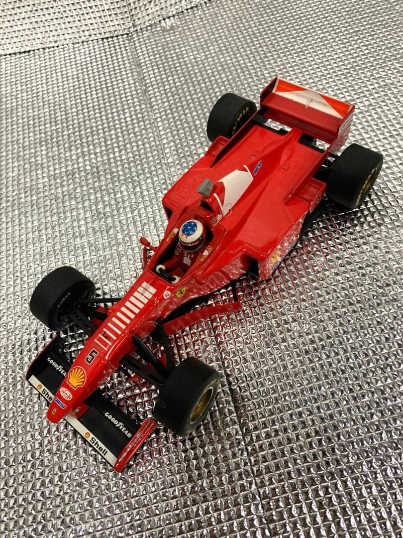 【ミニチャンプス　1997 フェラーリF310B M.シューマッハ　1/18】