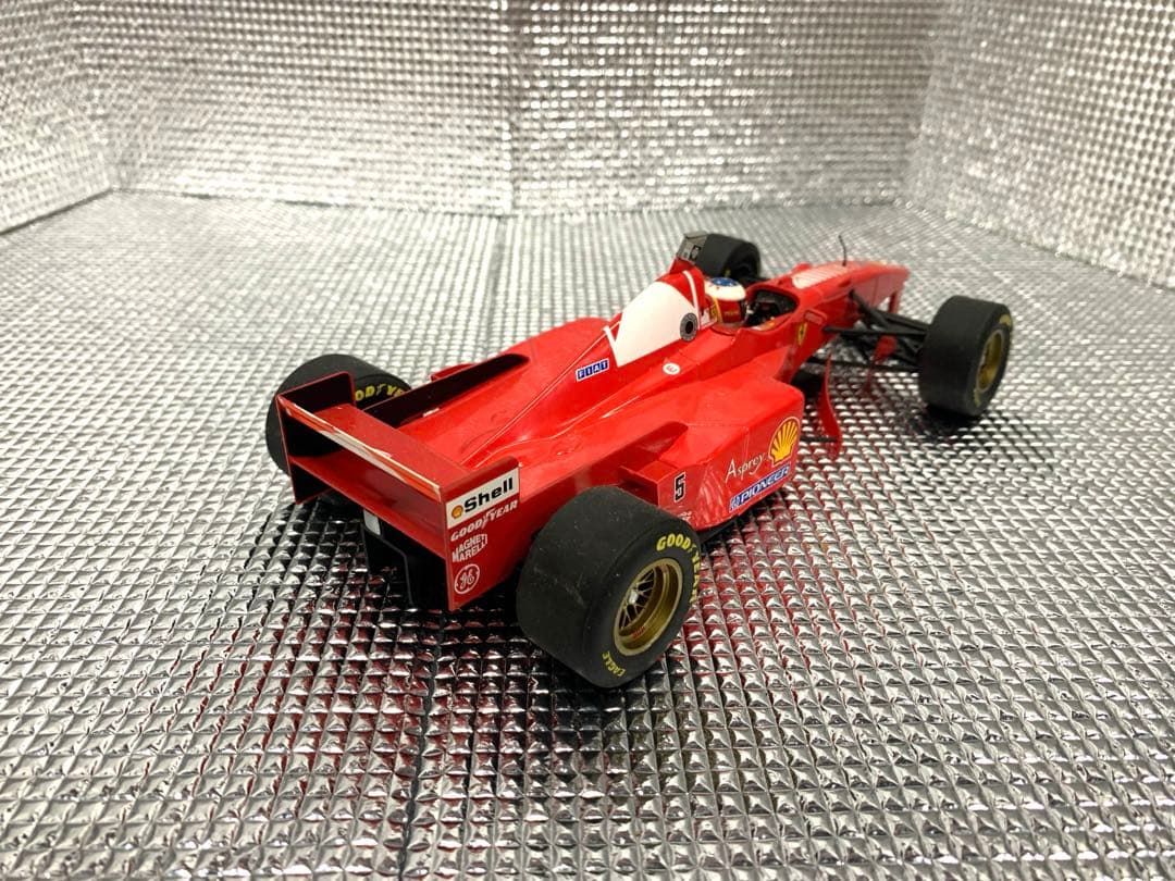 【ミニチャンプス　1997 フェラーリF310B M.シューマッハ　1/18】