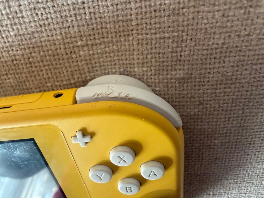 【中古】Nintendo Switch LITE イエローおまけ付き