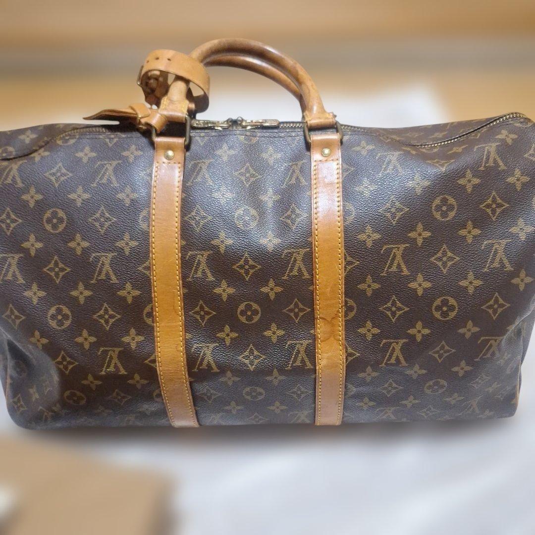 Louis Vuittonボストンバック 南京錠、ネームタグ収納袋付き