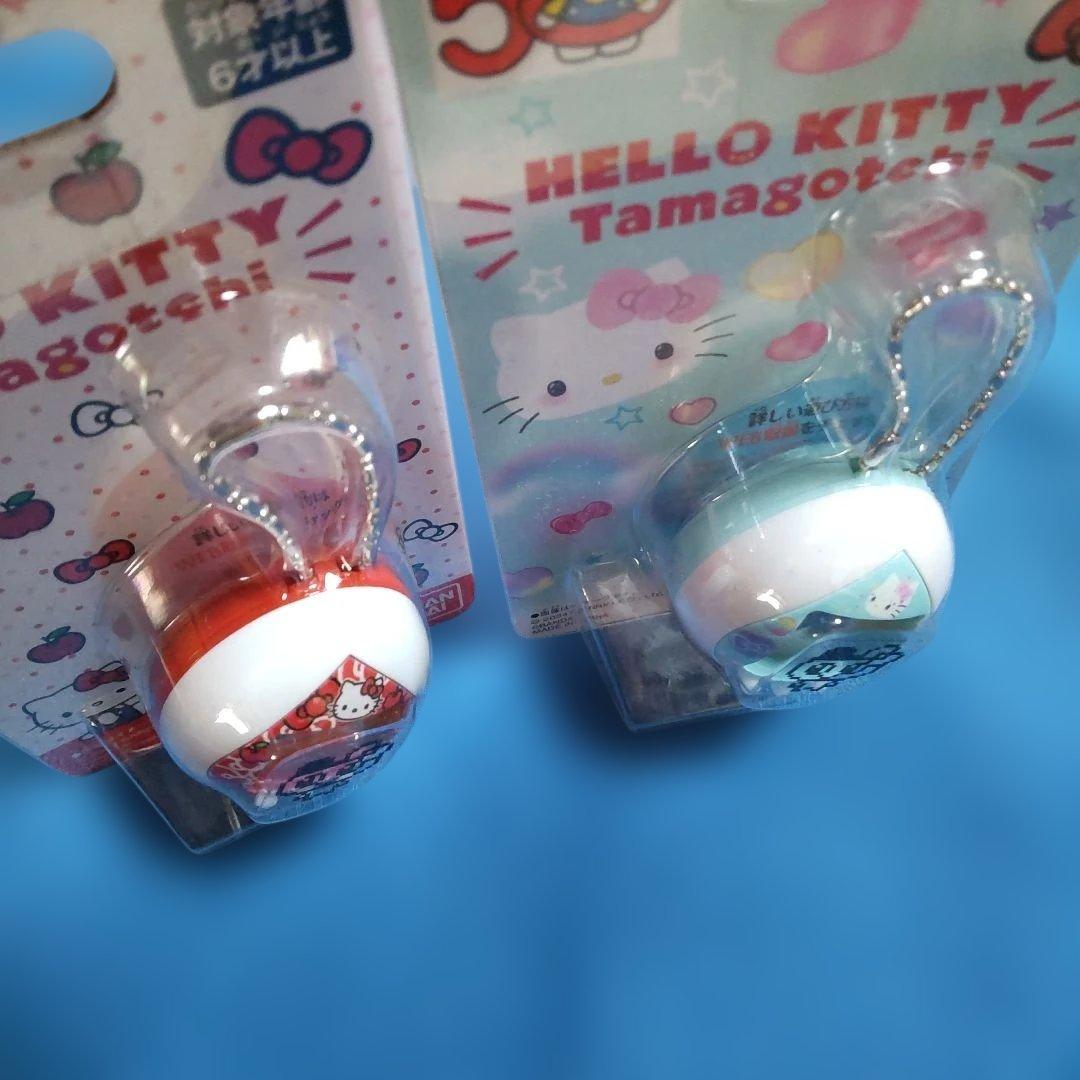 ハローキティたまごっち　50周年コラボ　BANDAI　レッド&スカイブルーセット