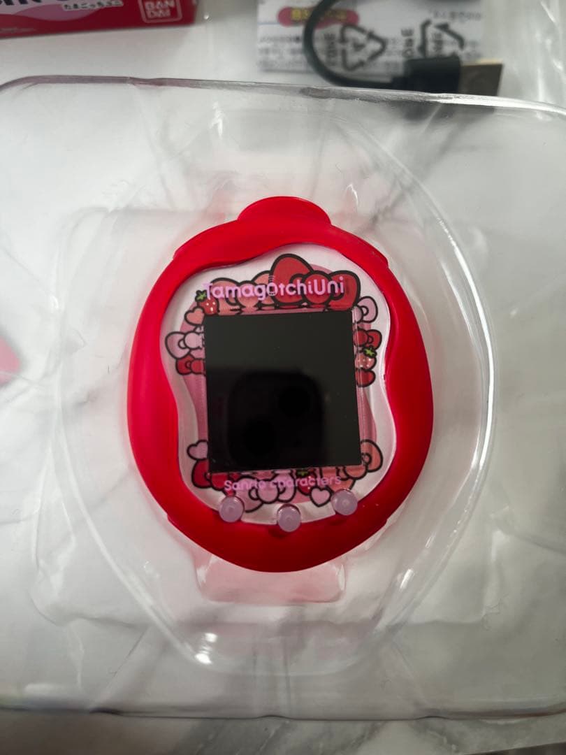 たまごっちuniサンリオキャラクター ケース付き