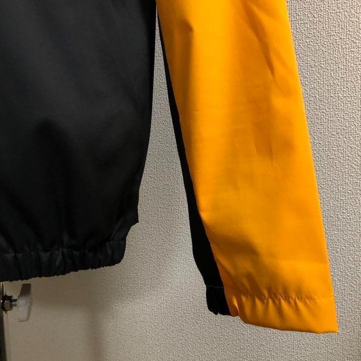 デサントゴルフ 三段切替 ウィンドジャケット イエローオレンジ XOサイズ