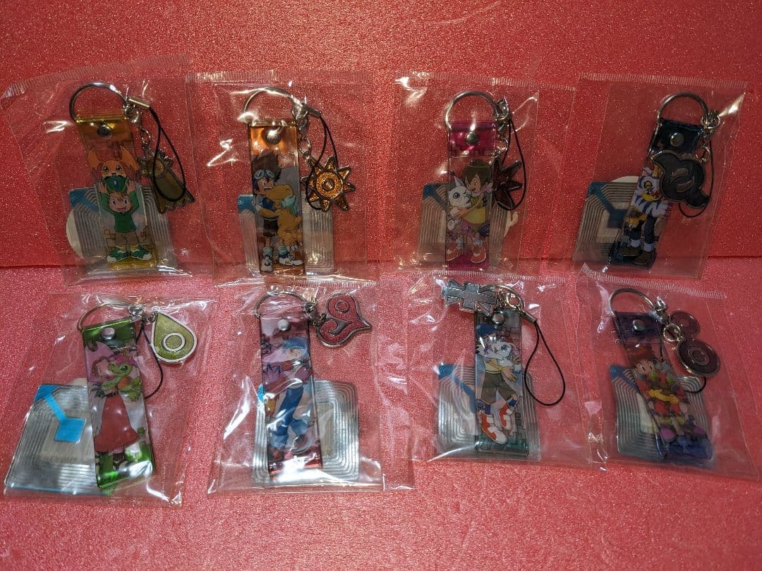 ：【デジモンアドベンチャー】グッズ「トレーディング紋章ストラップ(8個コンプ)」