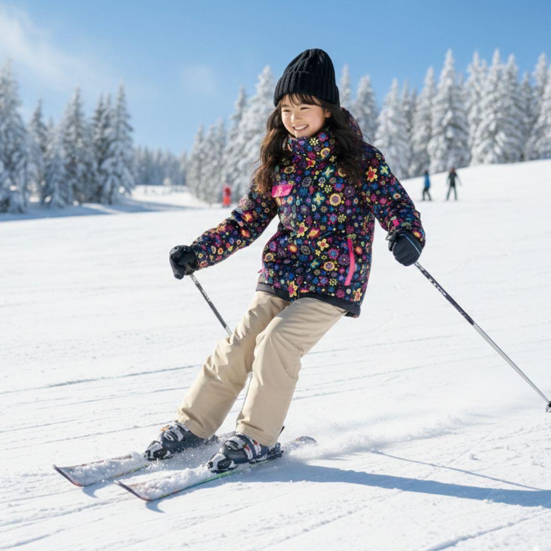 【美品】Phenix 女の子 スキーウェア 140 130調節 黒 花柄 上下