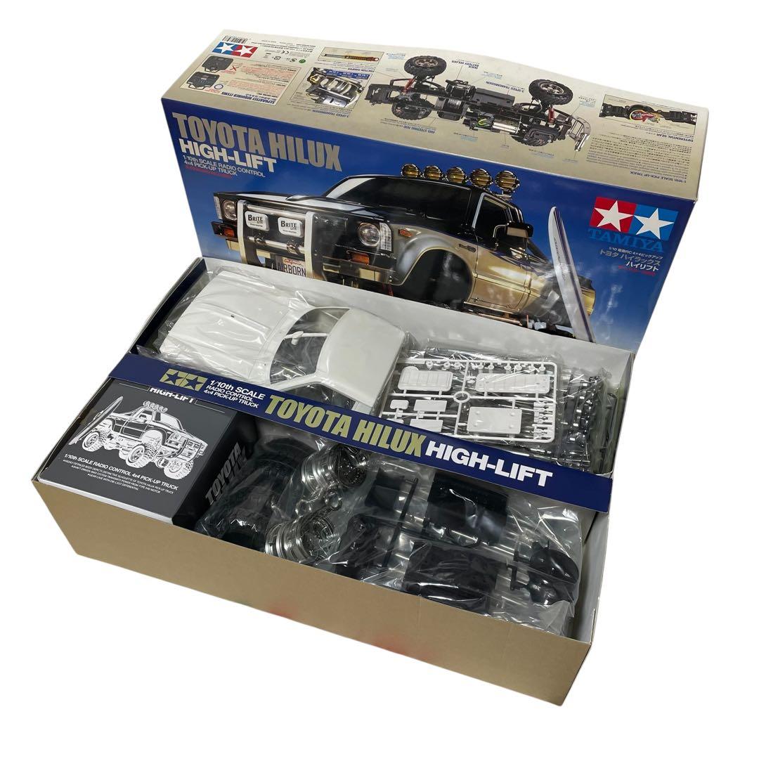 タミヤ 1/10RC トヨタハイラックスハイリフトサーフボード付き　未組立キット
