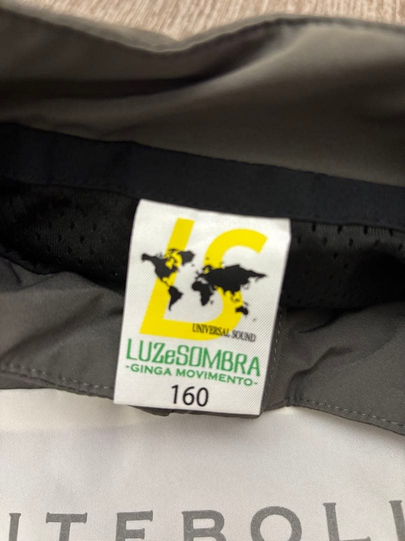 ルースイソンブラ ジュニア ストレッチタフタメッシュハーフジップトップ