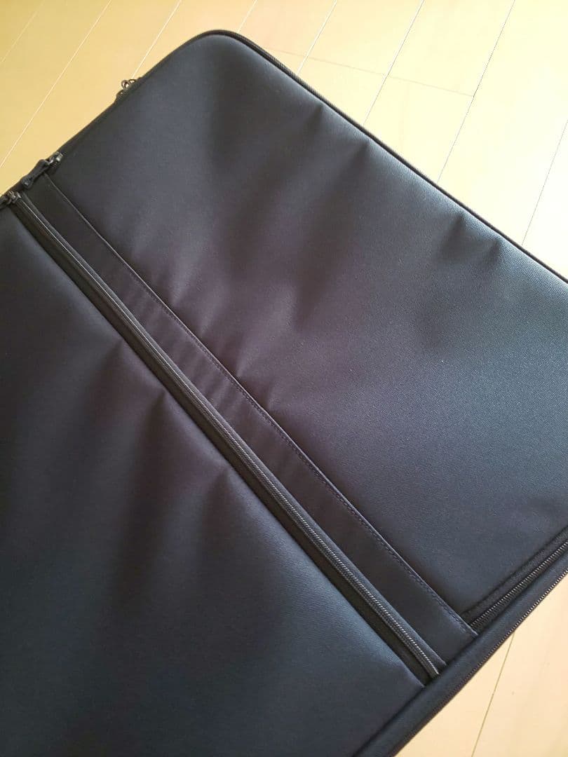 【新品未使用】無印良品 半分の厚みで収納できるソフトキャリーケース (XL)