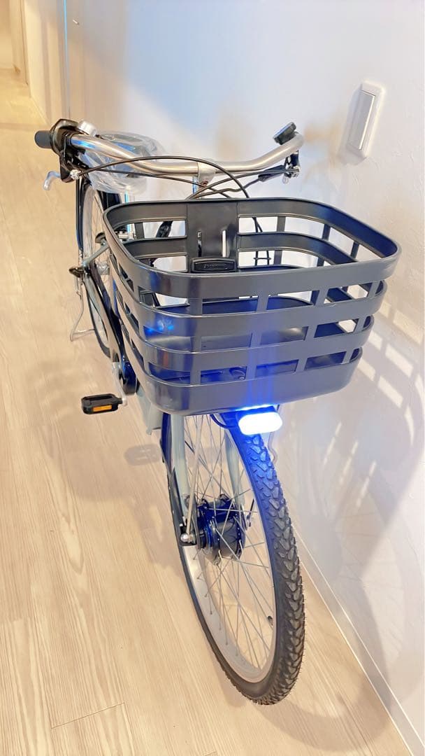 ブリヂストンの電動アシスト自転車、26インチ、ターコイズ。