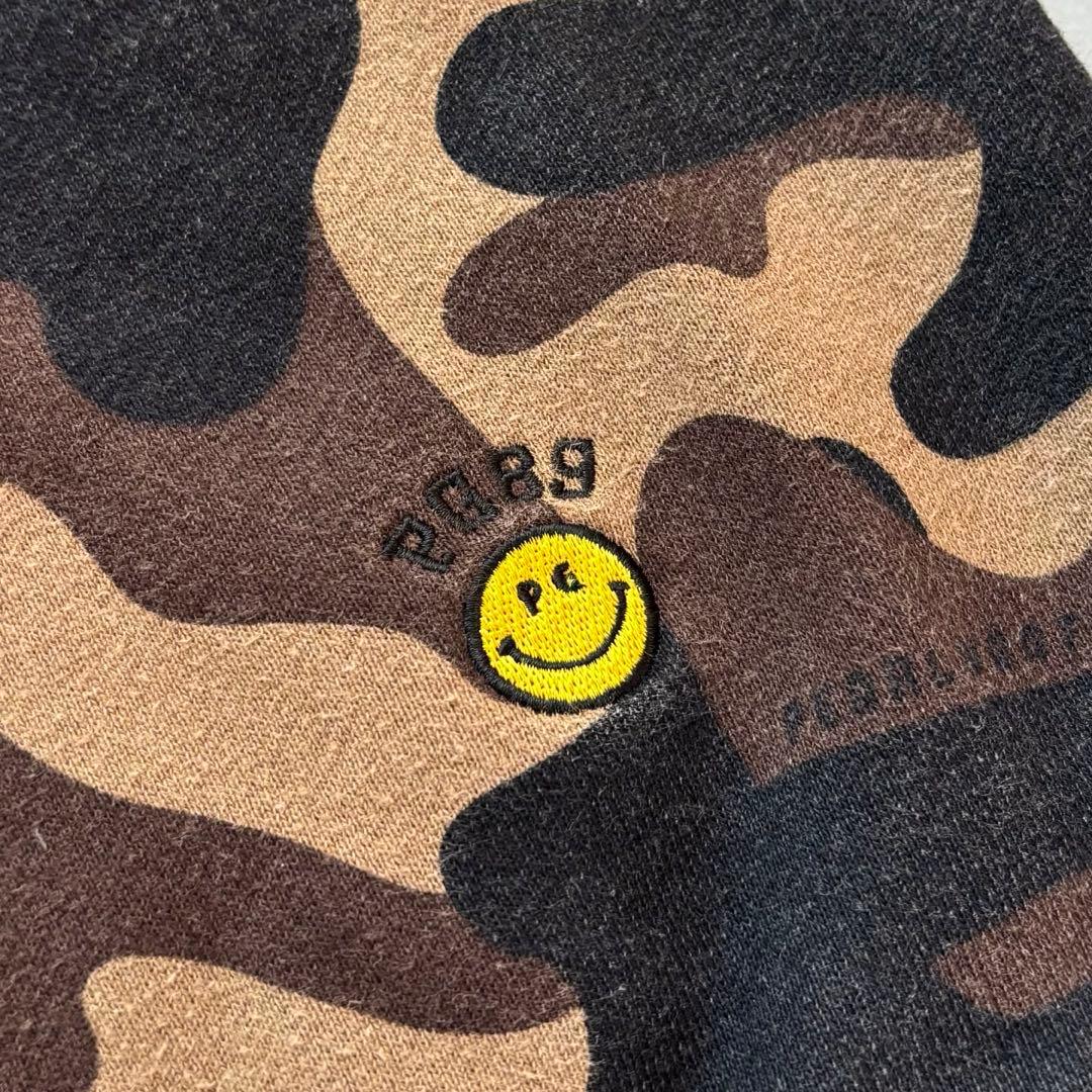 PEARLY GATES 迷彩カモフラ総柄 ジップフードパーカー にこちゃん刺繍