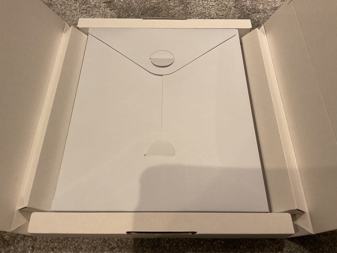 h*h様 MLXF2J/A Designed by Apple in Calif