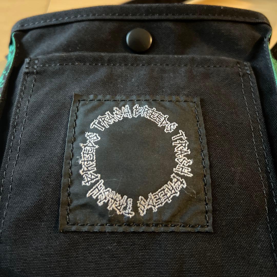 Trash breeds trash ポーチ green