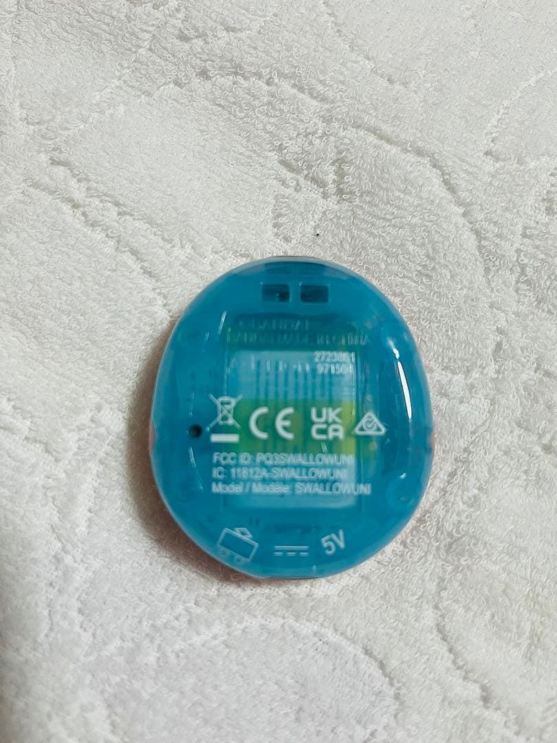 Tamagotchi Uni 本体とケースとガイド