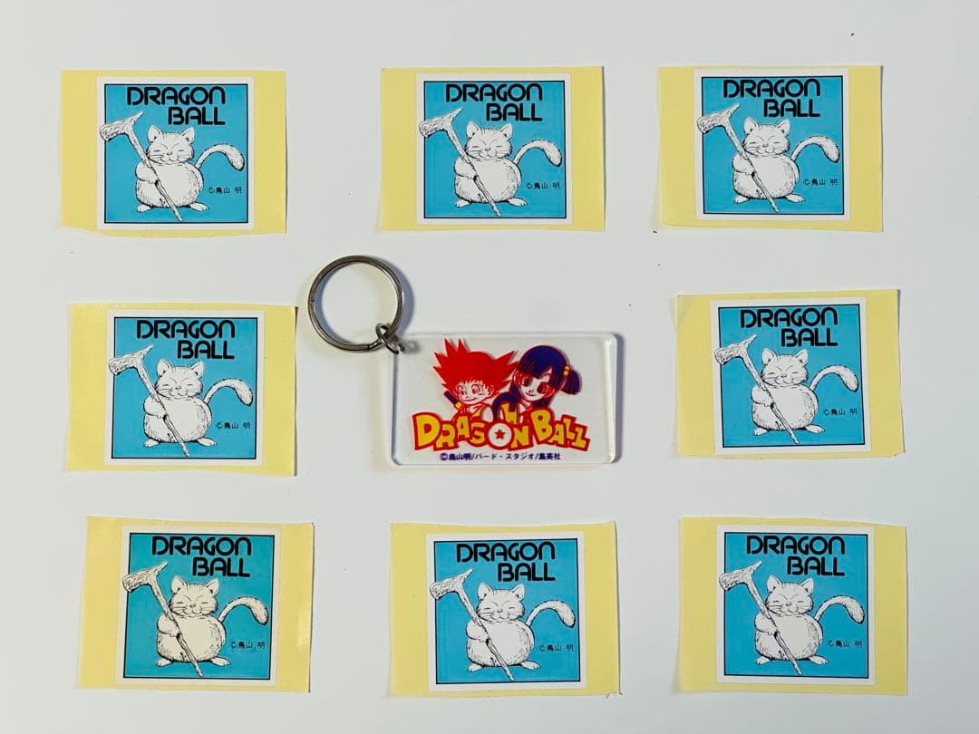 鳥山明保存会　ドラゴンボール「悟空ブルマのアクリルキーホルダー&カリン様シール」