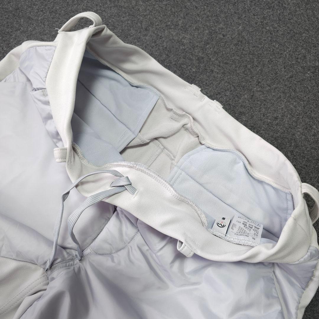 美品 アンパスィ ダンボールニット 中綿ストレッチゴルフパンツ LL