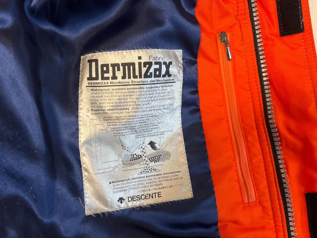DESCENTEデサント スキースノーボードウェア オレンジ/ネイビー サイズO
